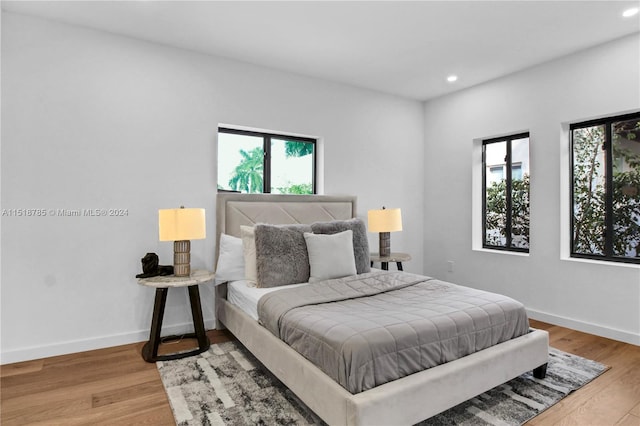 bedroom featuring hardwood / wood-style flooring