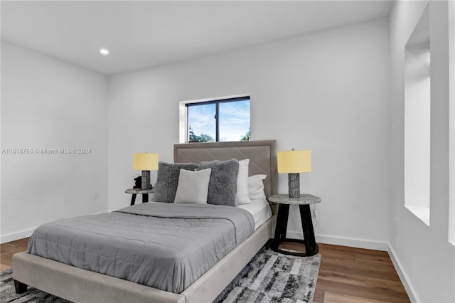 bedroom featuring hardwood / wood-style floors