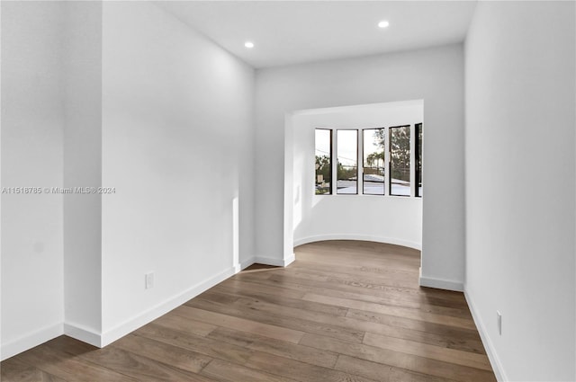 unfurnished room featuring wood-type flooring