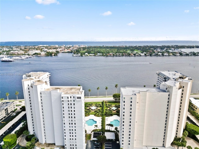 birds eye view of property featuring a water view