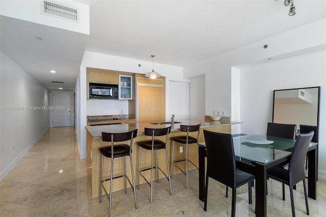 view of tiled dining room