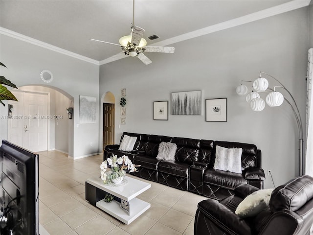 living room featuring ceiling fan, light tile flooring, and ornamental molding