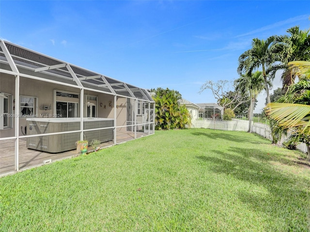 view of yard featuring a lanai and a patio area