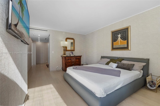 bedroom featuring pool table and light hardwood / wood-style floors