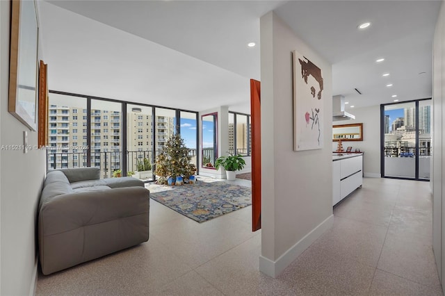 living room with floor to ceiling windows