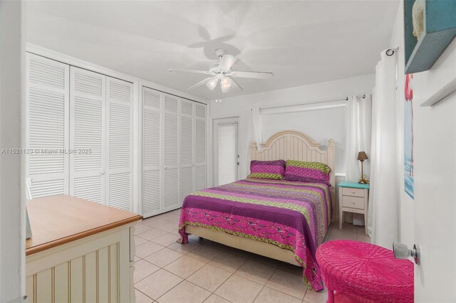 tiled bedroom with ceiling fan