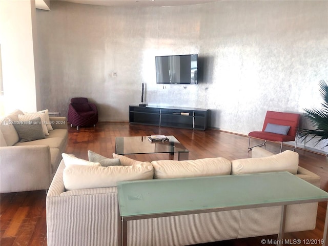 living room with dark wood-type flooring