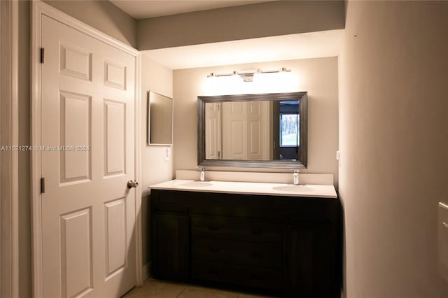 bathroom with dual vanity