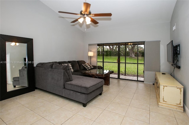 living room featuring high vaulted ceiling, ceiling fan, and light tile floors