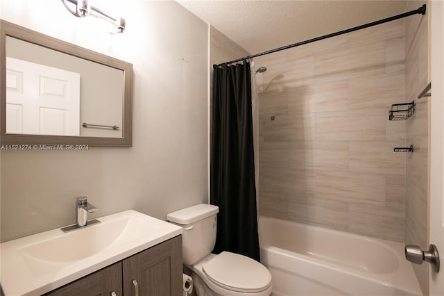 full bathroom featuring a textured ceiling, toilet, shower / tub combo, and vanity