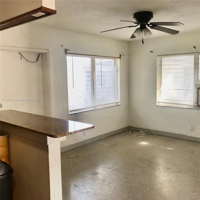 spare room featuring ceiling fan