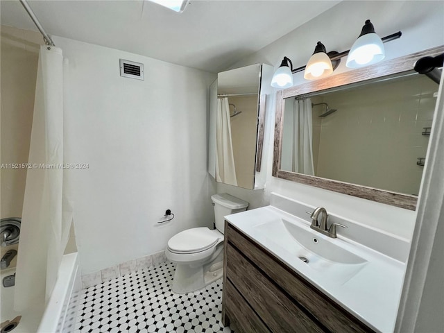 full bathroom featuring toilet, shower / tub combo, tile floors, and vanity