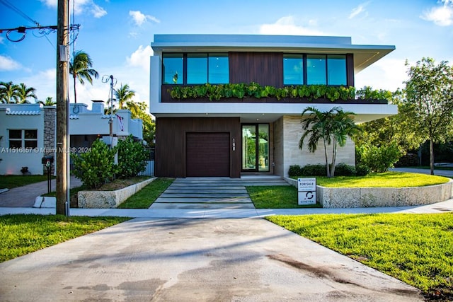 contemporary home featuring a front yard