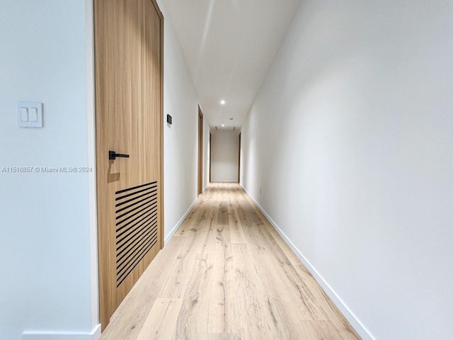 hallway featuring light hardwood / wood-style floors