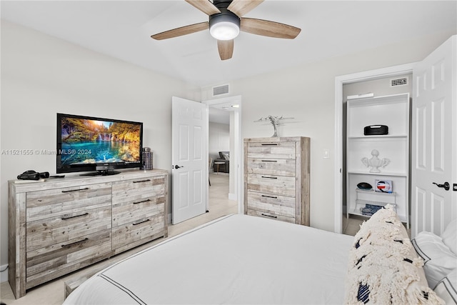 carpeted bedroom featuring ceiling fan