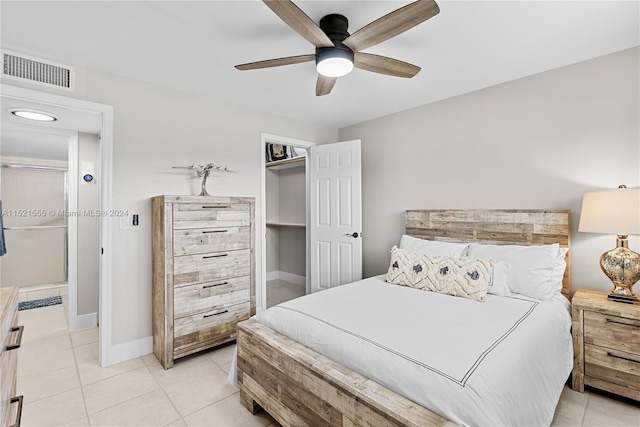 bedroom with light tile flooring and ceiling fan