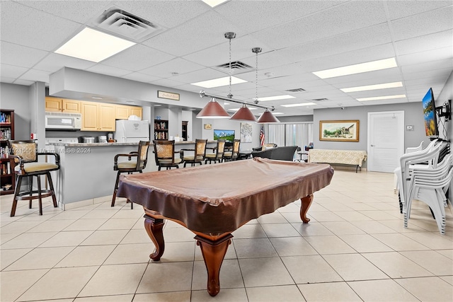 playroom featuring a paneled ceiling, billiards, and light tile flooring