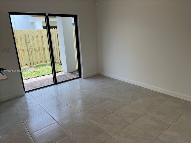 view of tiled spare room