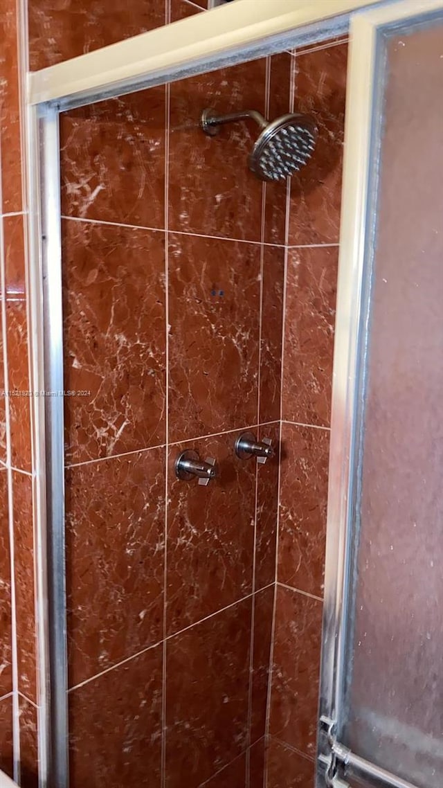 room details with a tile shower