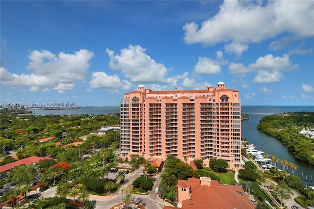 view of building exterior with a water view