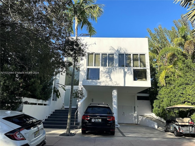 view of front of house featuring a carport