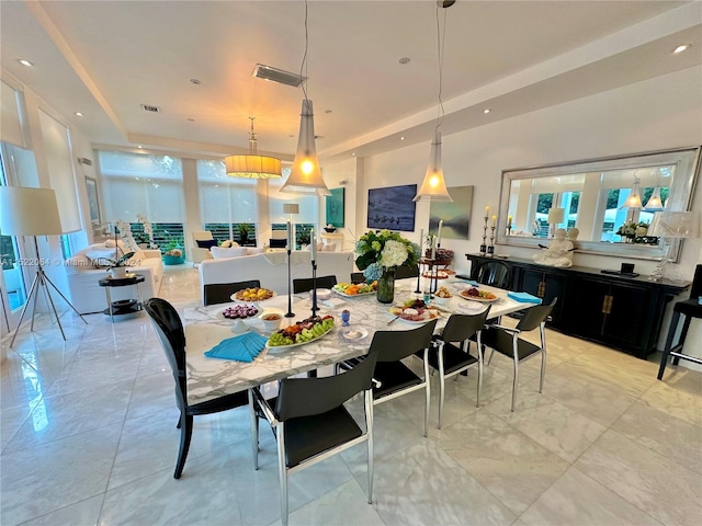 dining area with light tile floors