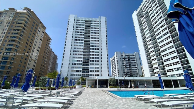 view of swimming pool with a patio area