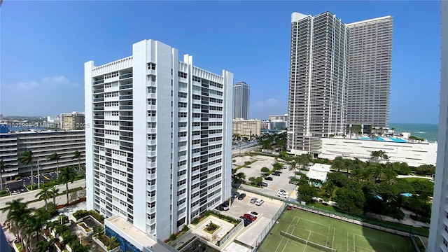 view of building exterior with a water view