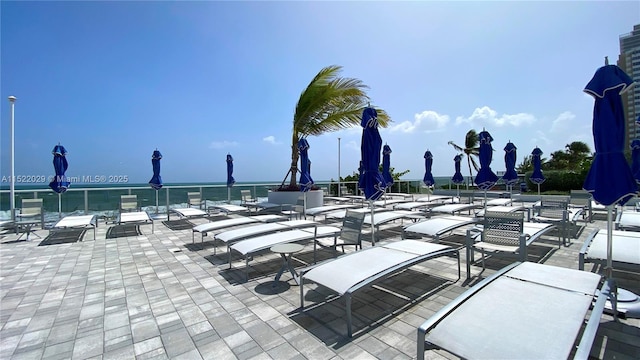 view of patio / terrace featuring a water view