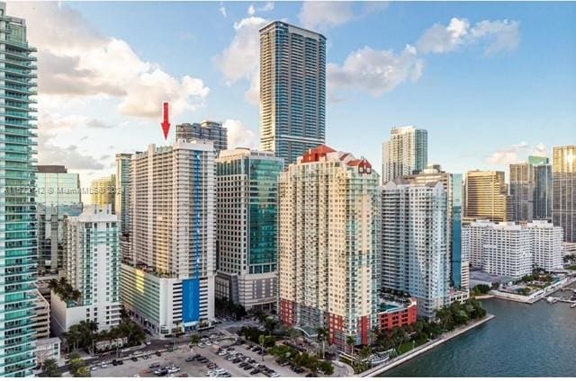 property's view of city with a water view