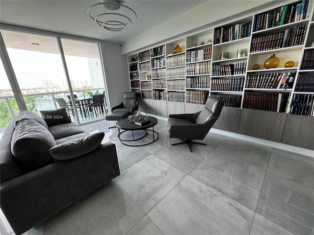 interior space featuring floor to ceiling windows and light tile flooring