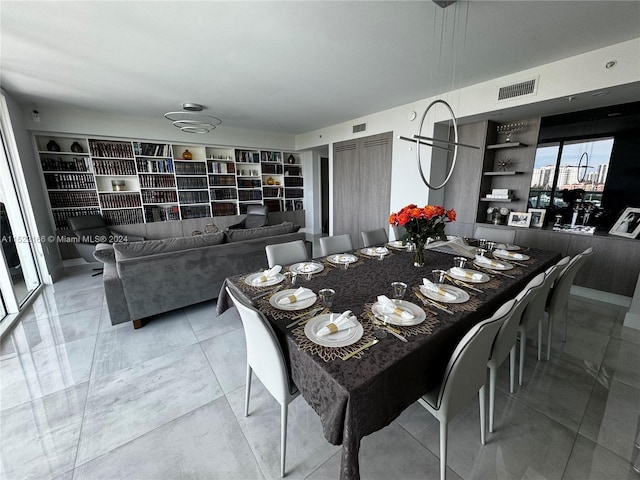dining room with light tile floors