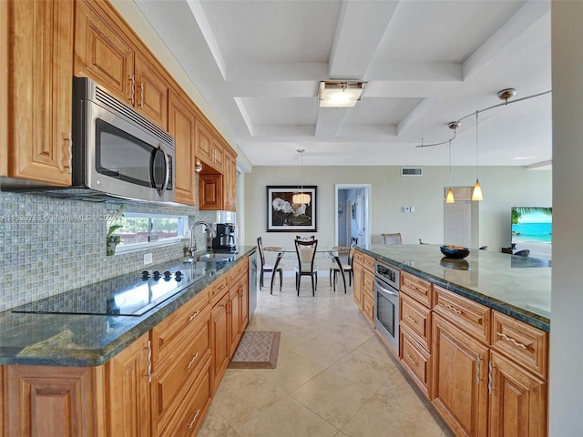 kitchen with backsplash, stainless steel appliances, coffered ceiling, pendant lighting, and sink