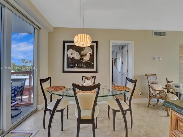 view of tiled dining space