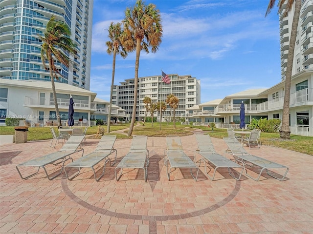 view of property's community with a patio area