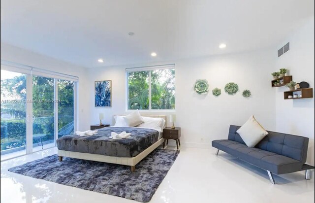 bedroom with access to exterior, recessed lighting, visible vents, and multiple windows