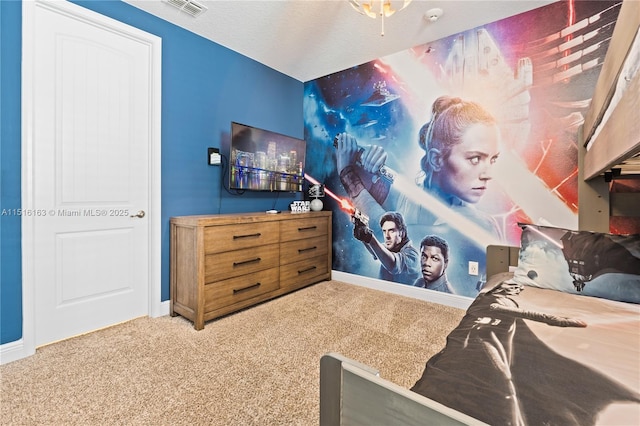 carpeted bedroom with a textured ceiling