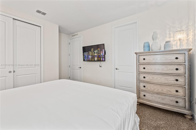 carpeted bedroom featuring a closet