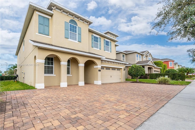 view of front of home with a garage