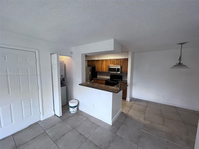 kitchen featuring decorative light fixtures, light tile floors, range with electric stovetop, fridge, and tasteful backsplash