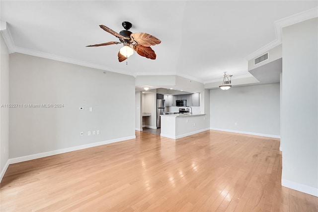 unfurnished living room with ceiling fan, light hardwood / wood-style flooring, and ornamental molding