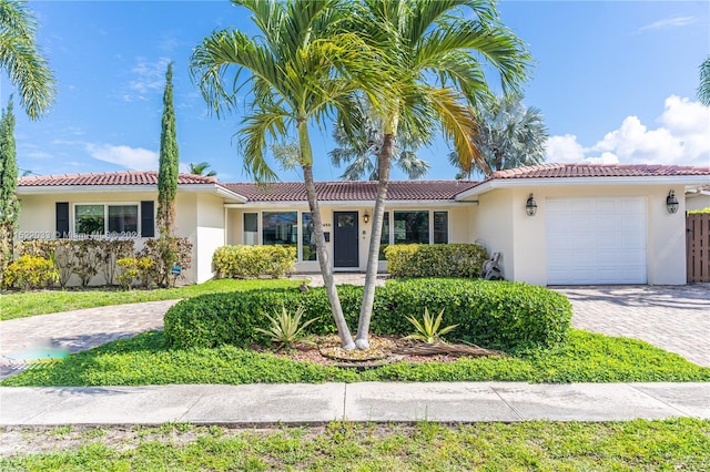 view of front of property featuring a garage