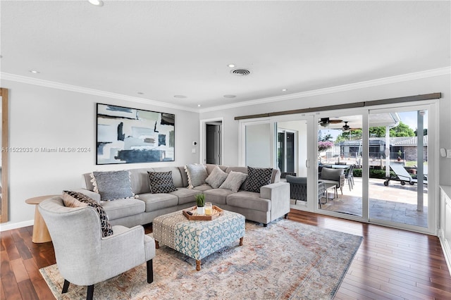 living room with crown molding, french doors, and dark wood-type flooring