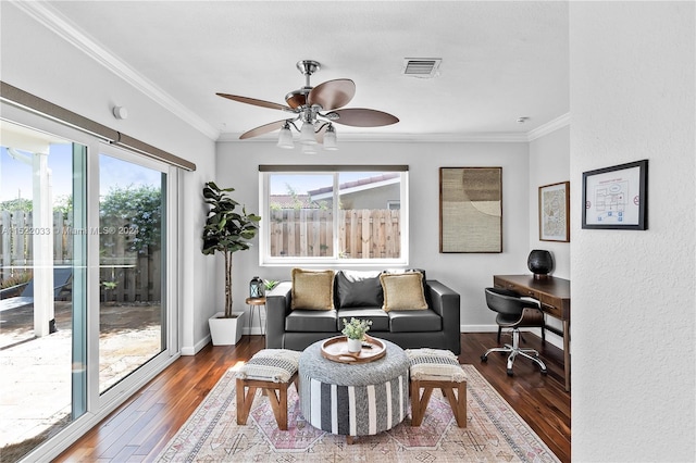 interior space with crown molding, ceiling fan, and dark hardwood / wood-style flooring