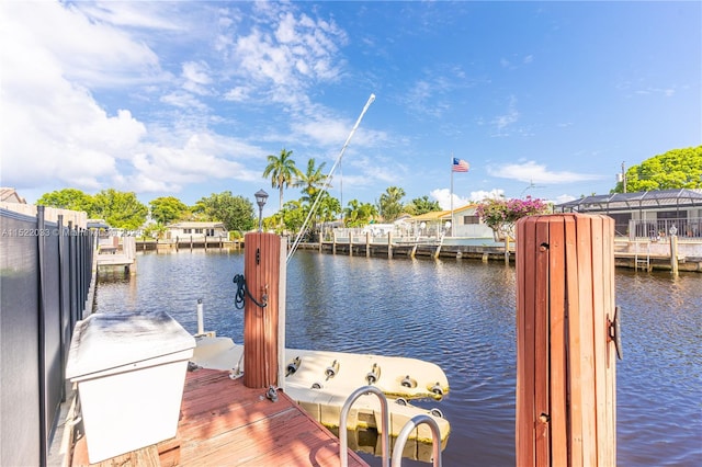 dock area featuring a water view