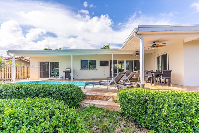 back of house with a patio area and ceiling fan