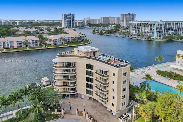 birds eye view of property featuring a water view