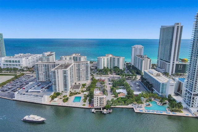 birds eye view of property featuring a water view