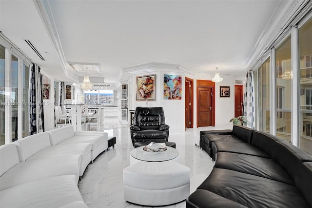 living room featuring a chandelier, crown molding, and light tile floors