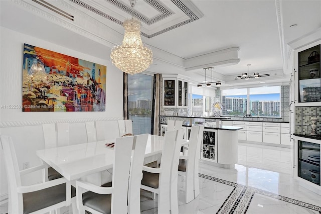 dining space with light tile floors and a chandelier